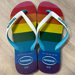 Unisex! Never been worn rainbow colored Havaianas. Size 11/12 women’s/9/10 men’s